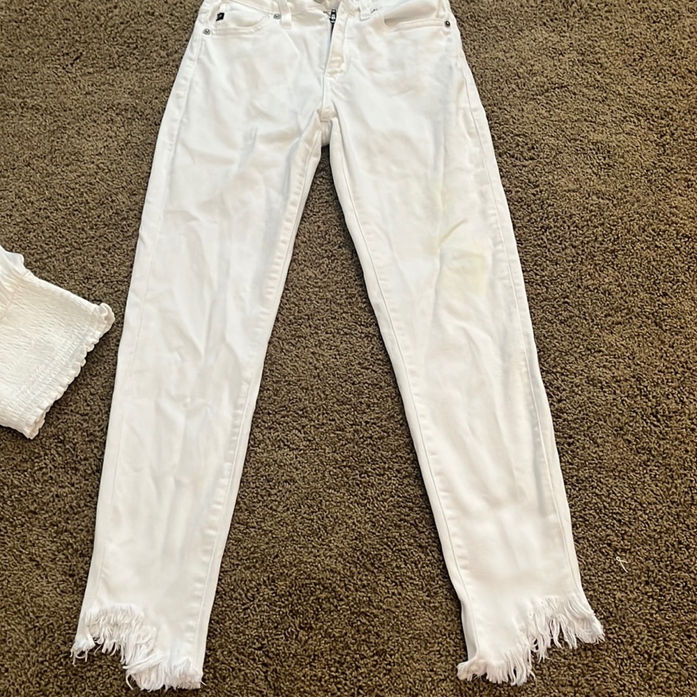 white jeans with fray at end.